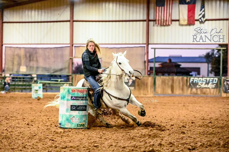 Barrel horse and rider in the turn